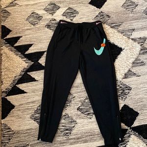 Black Nike sweatpants.
